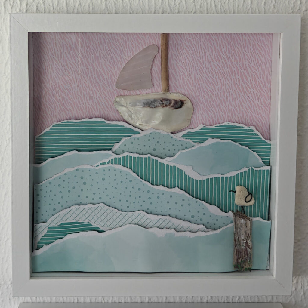 Segelboot mit Möwe